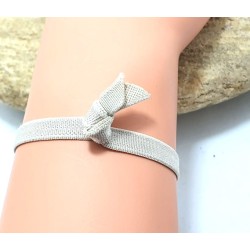 Bracelet élastique avec papillon argenté en strass