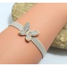 Bracelet élastique avec papillon doré en strass