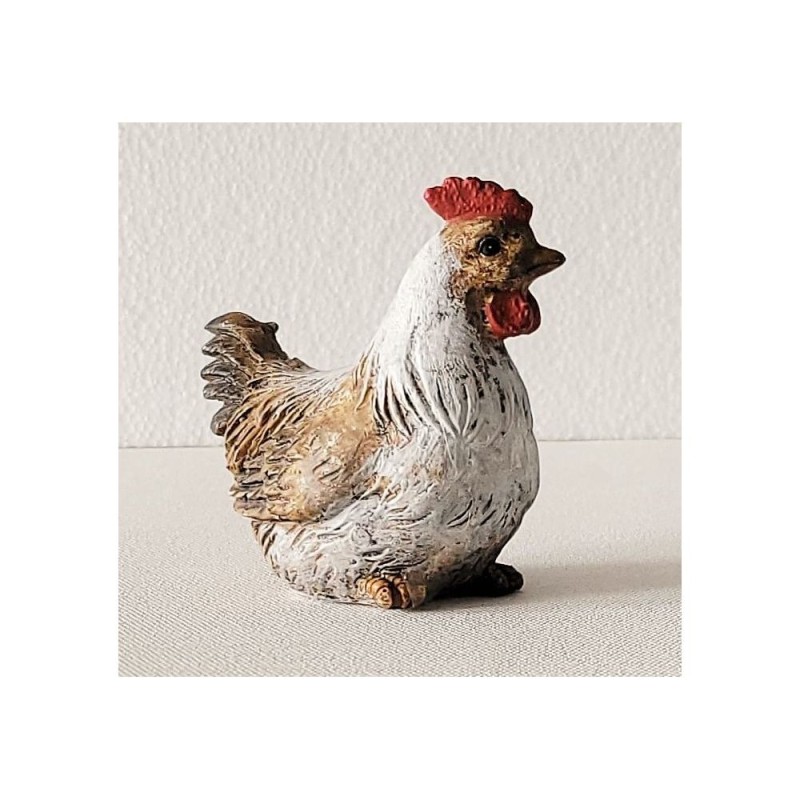 Poule assise