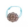 Bracelet élastique turquoise avec rosace en métal doré