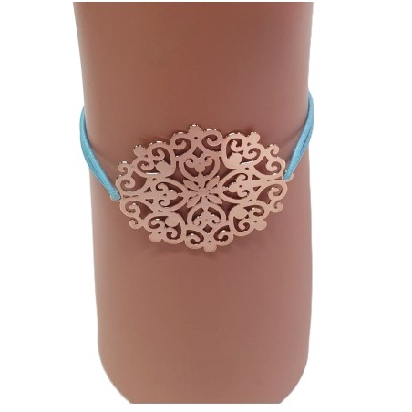 Bracelet élastique turquoise avec rosace en métal doré