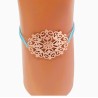 Bracelet élastique avec rosace en métal doré